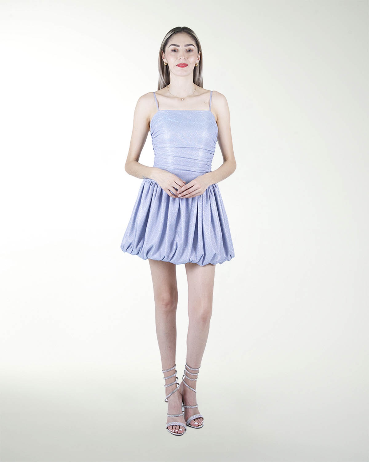 VESTIDO AN STRAPLESS PLISADO EN LA FALDA